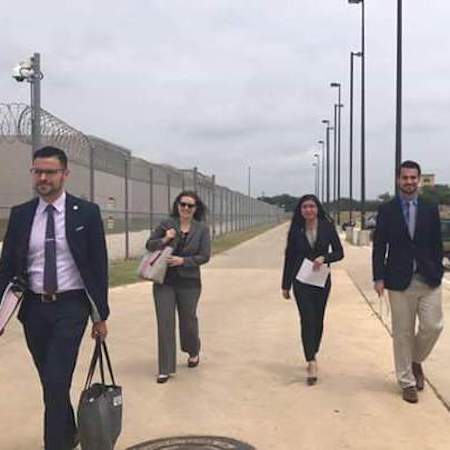 A team from St. Mary's approaches the detention center.